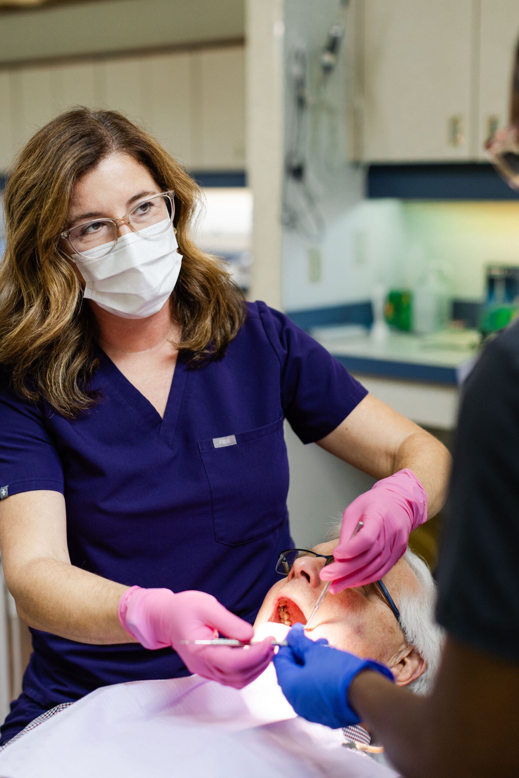 Dr. Lindsay providing dental care